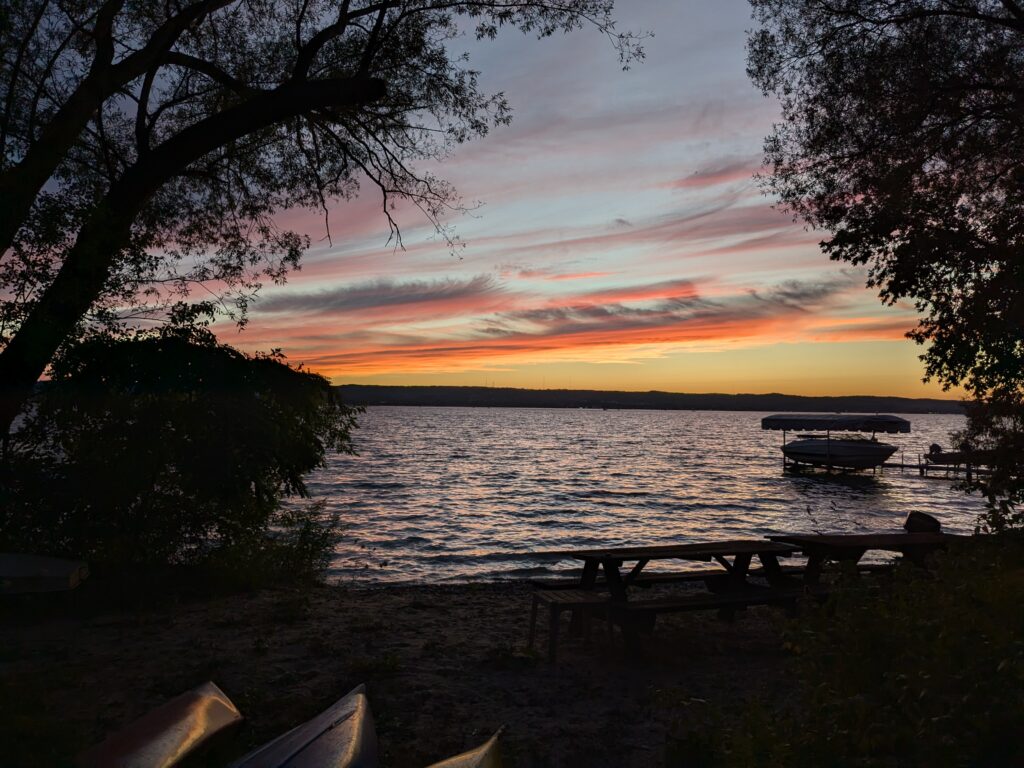 sunset from a private beach on grand traverse bay